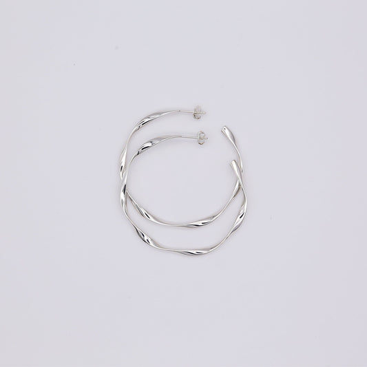 Large twisted hoop earrings, sterling silver, high polish finish